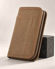 Brown Fieldwork canvas zip-around cover with front slip pocket and grey zip